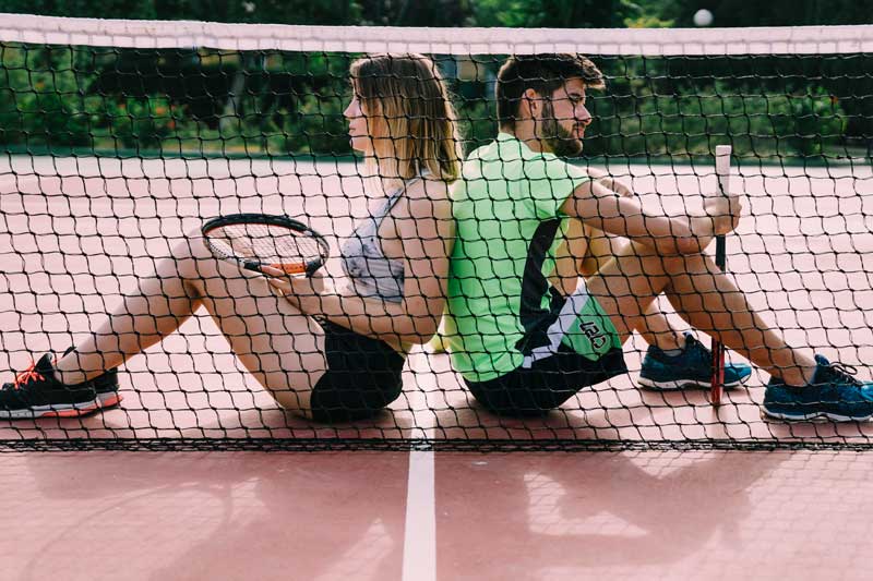 Mujer y hombre tenis