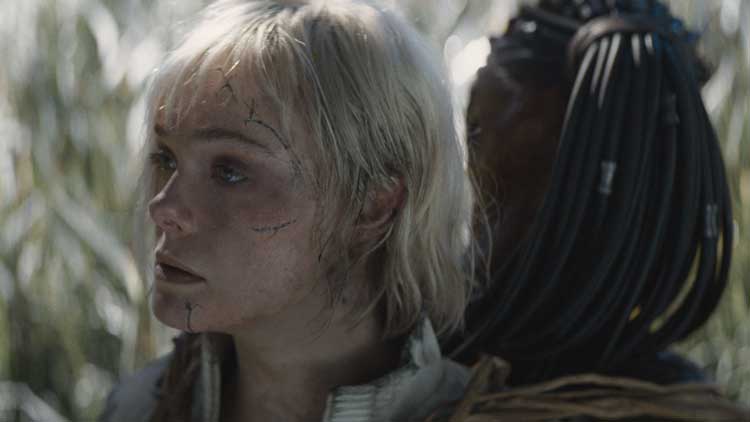 Elle Fanning como Thia y Dimitrius Schuster-Koloamatangi como Dek en 'Predator: Badlands'