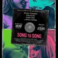 Song to song cartel reducido